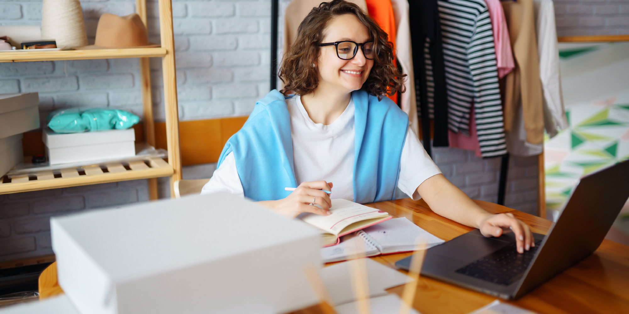 woman sitting at desk with computer